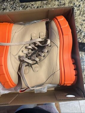 Sorel Women’s  Beige Boot with Bright Orange Platform Sole